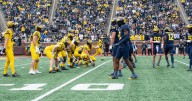 Michigan handed multimillion-dollar fine and head coach Sherrone Moore given additional suspension for sign