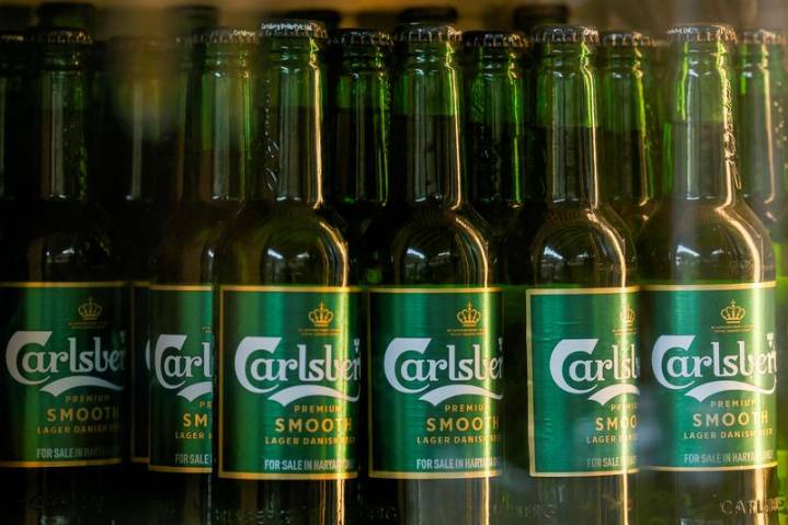 Carlsberg misses first-half forecasts, warns of difficult year