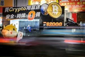 Stocks diverge as bitcoin hits record high