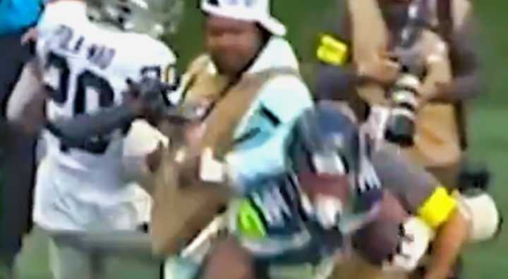 VIDEO: Cameras Caught Marshawn Lynch Delivering Vicious Elbow To The Back Of Seahawks RB While Working As Sideline Photographer During Preseason Game