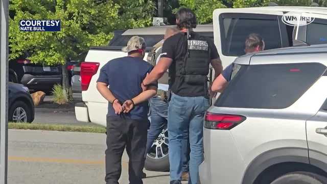 Video shows arrest in Manchester of convicted murderer accused of kidnapping missing teenager