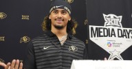 As girl dog Dad, julian Lewis doesn't let TDs or INTs define him