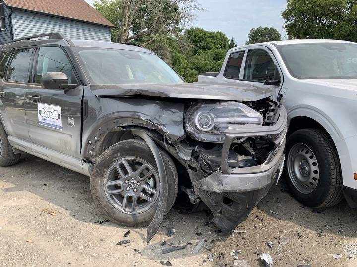 Vehicle crashes into Verona home, two parked cars; driver flees scene