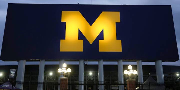 Michigan football fined 10s of millions of dollars, coach suspended 3 games in sign