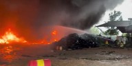 Responders work to contain fire at Woodville tire recycling plant after lightning strike