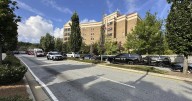 Police say a suspect is dead and a police officer has been injured near the CDC and Emory University