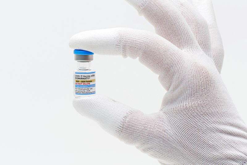 FDA approves updated COVID-19 shots with limits for some kids and adults
