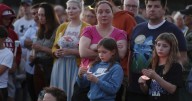 Hundreds honor 2 children killed and 17 people wounded in shooting at a Minneapolis Catholic school