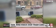 Rain, wind knock over trash cans in the Las Vegas Valley
