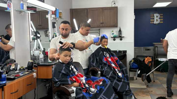 Camden barbershop gives out school supplies, free haircuts to kids