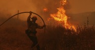 Fast-growing brush fire forces thousands to evacuate north of Los Angeles