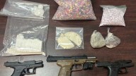 Buckets of drugs found in woods behind Anderson County home