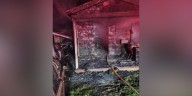 House catches fire after food left unattended on stove, firefighter taken to hospital