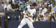 Collins homers off Diaz in the 9th inning to give MLB