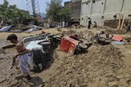 Pakistan expands rescue and relief efforts after floods kill over 200 in a single district