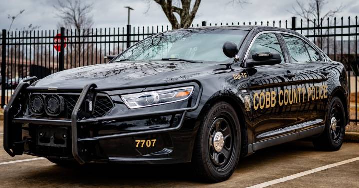 Cobb officer arrested, charged with distributing obscene material