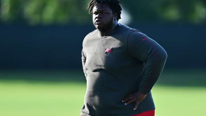 NFL's heaviest player at 464lbs who was deemed too fat to play brutally CUT after missing whole of camp to lose weight