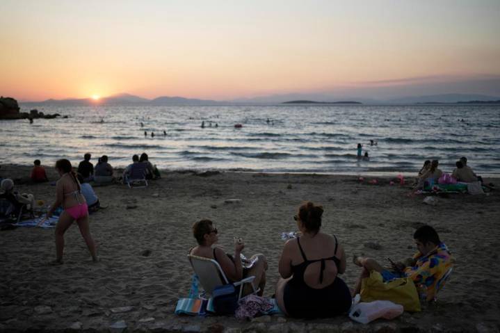 Beach on a budget: Greeks settle for day trips, priced out of iconic destinations