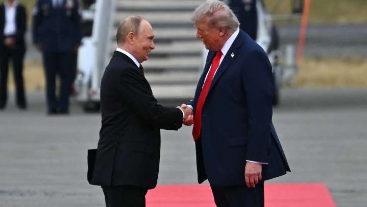 Trump, Putin shake hands on tarmac at Alaska summit…