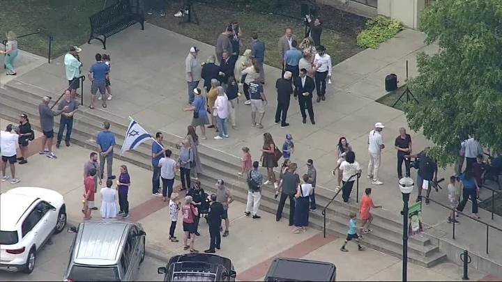 Community rallies against hate after nazi flags found at Rockwall