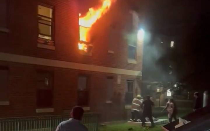 Resident jumps from window as Somerville fire displaces 18