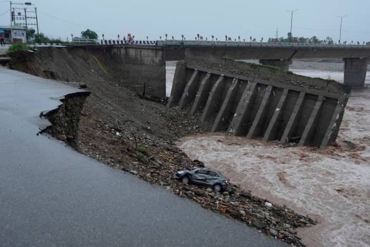Flash floods leave 34 dead in Indian-controlled Kashmir as over 200,000 in Pakistan are displaced