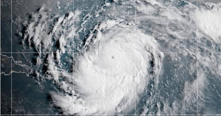 Hurricane Erin weakens to Category 3 as forecasters wait for northward turn