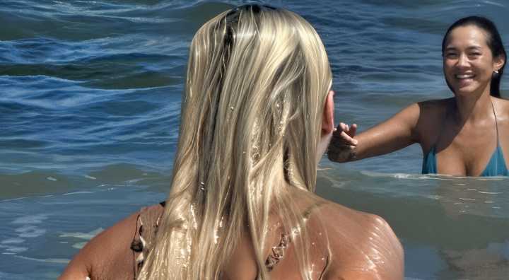 Olivia Dunne Went Full Cheeks Out In Her Leopard Print Bikini While Hitting The Beach & The Waves