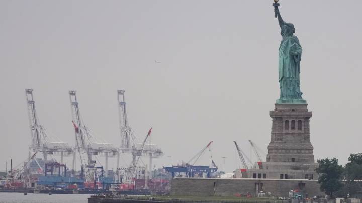 Trump’s new tariffs go into effect as US economy shows signs of strain