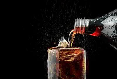 If You Buy Coca-Cola With $10,000 in 2025, Will You Become a Millionaire in 10 Years?