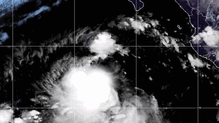 Tropical storms Juliette and Fernand churn over open waters in different oceans