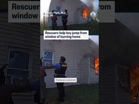 Rescuers help boy jump from window of burning home