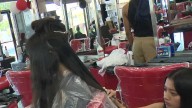 Sacramento students receive free backpacks and haircuts at giveaway event