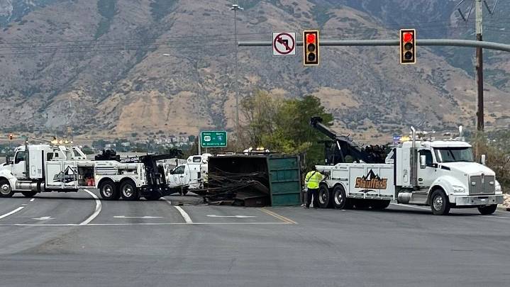 Semi truck rollover in Provo closes I