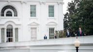 Up on the roof, Trump surveys the home he’s making his own