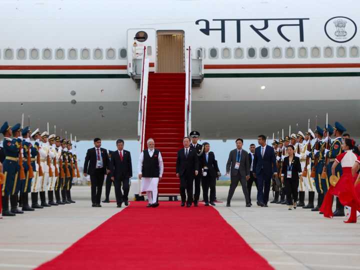 India committed to improving ties with China, Modi tells Xi