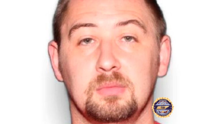 US manhunt for 'dangerous' murder suspect who dropped off baby after four relatives found dead