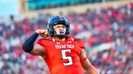 Patrick Mahomes reacts after his former college Texas Tech sign up 5