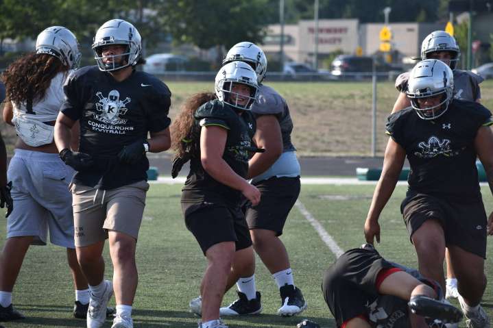 Kentwood’s Quincey Davidson brings new type of Energy to Conk Football