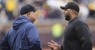 Michigan football fined millions of dollars, Moore suspended