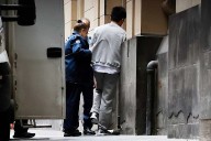 Doctor accused of secretly recording 4,500 videos in Australian hospital restrooms released on bail