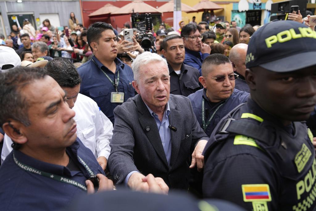 Ex-president Álvaro Uribe honors slain Colombian candidate and calls for stronger security