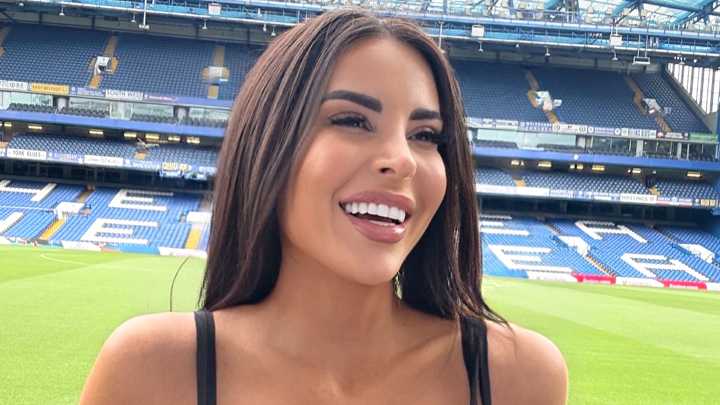 Kim Kardashian lookalike and football presenter sends fans wild in low-cut top as she watches Chelsea beat Leverkusen