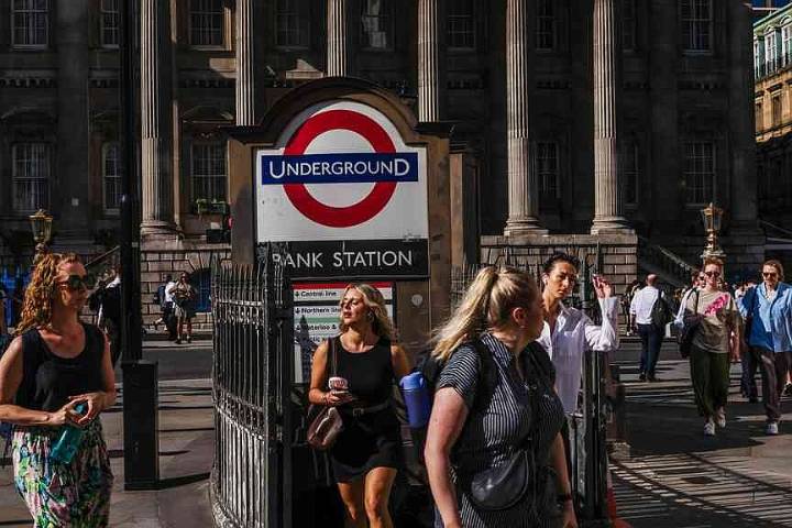 NYC’s subway train riders stay cool, as London’s sweat