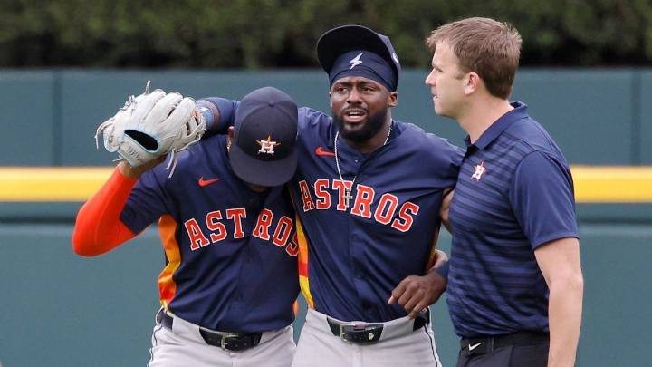 Astros' Taylor Trammell leaves game after crashing into fence