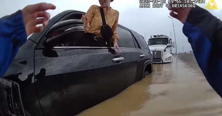 CAUGHT ON CAMERA: Chattanooga officer helps drivers (and a dog) out of flooded cars
