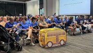 Striking Evergreen workers pack public meeting