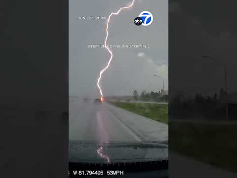 Lightning strikes right in front of pickup