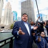 Trump’s threat to deploy troops to Chicago sparks fear and defiance in a city on edge