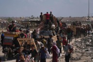Israel declares Gaza’s largest city a combat zone as the bodies of 2 hostages are recovered